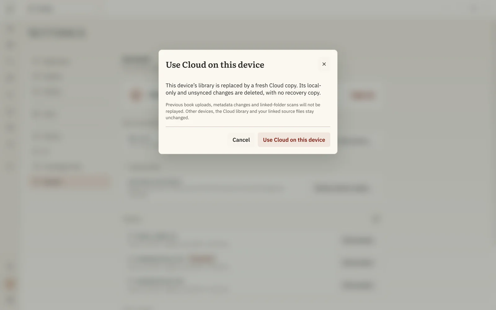 Use Cloud on this device confirmation, explaining that changes only on this computer will be discarded and the account's library will be downloaded.